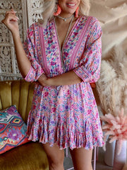 Vestido irregular con escote en V floral