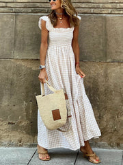 Kariertes, elastisches Kleid mit Hosenträgern