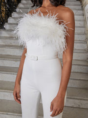 Mono con top de tubo y plumas