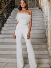 Mono con top de tubo y plumas