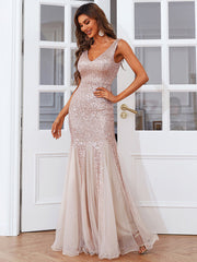 Elegantes, ärmelloses Abendkleid mit Netznähten und V-Ausschnitt sowie schlichtem Paillettenbesatz