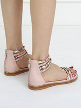 Zapatos romanos planos