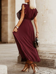 Falda plisada de gasa con mangas con volantes para playa