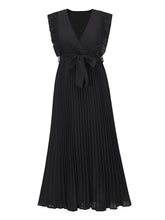 Falda plisada de gasa con mangas con volantes para playa