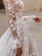 Vestido de novia de manga larga con encaje