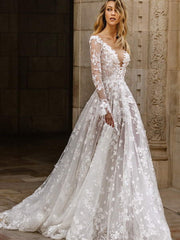 Brautkleid mit langen Ärmeln aus Spitze