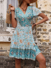 Vestido de una pieza azul con estampado retro