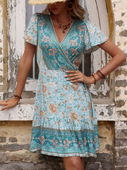 Blaues einteiliges Kleid mit Retro-Print