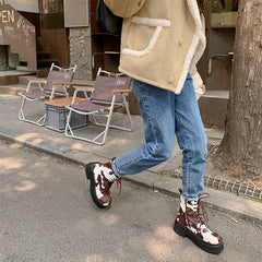 Botas con estampado de vaca marrón Nila