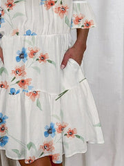 Vestido de encaje con tirantes y bolsillos con volantes estampados