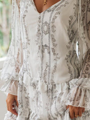 Bedrucktes Langarmkleid mit Rüschen und Krawatte