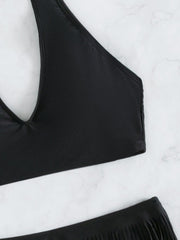 Traje de baño de bikini sexy con flecos y escote de color sólido
