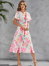 Vestido estampado de manga corta con cordones