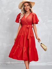 Vestido de manga corta con cinturón de color liso