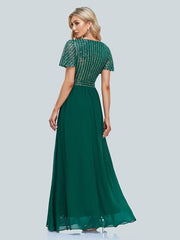 Ballkleid aus Gaze mit Pailletten