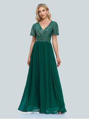 Ballkleid aus Gaze mit Pailletten