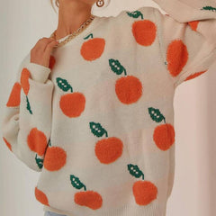 Süßer Pullover mit orangefarbenem Muster