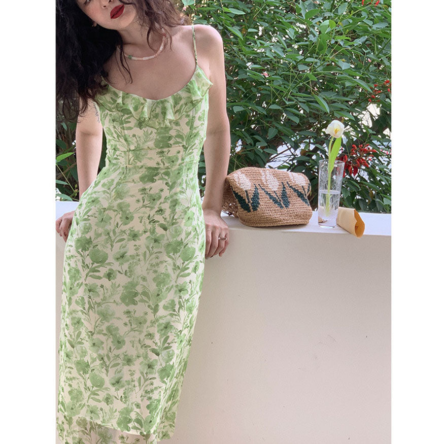 Vestido midi con estampado floral y volantes