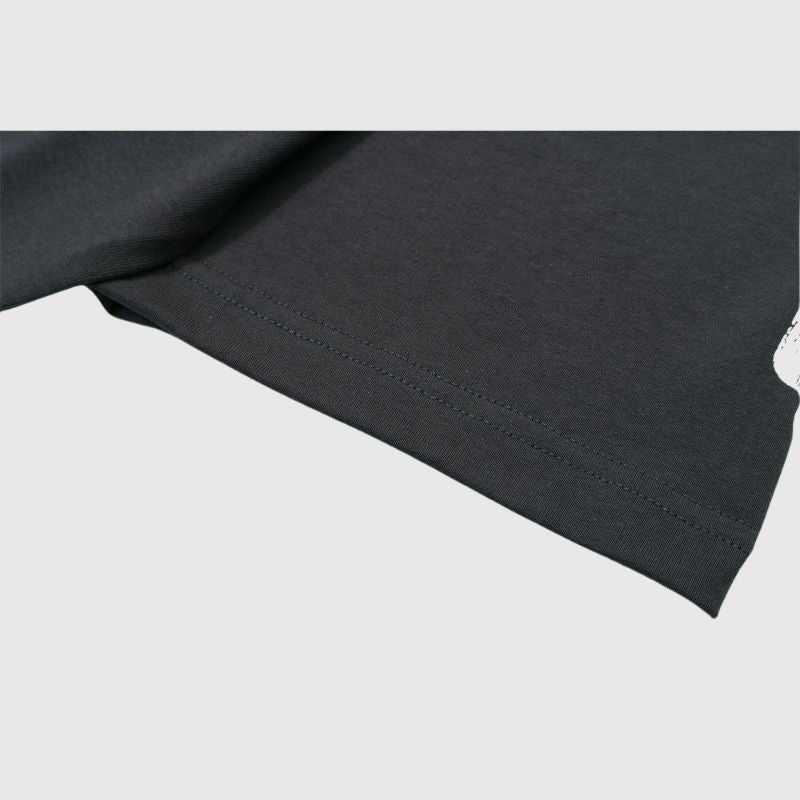 Camiseta polo con parche de medalla