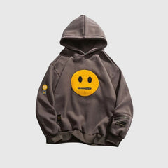 Sudadera con capucha de patchwork con cara sonriente de estilo callejero