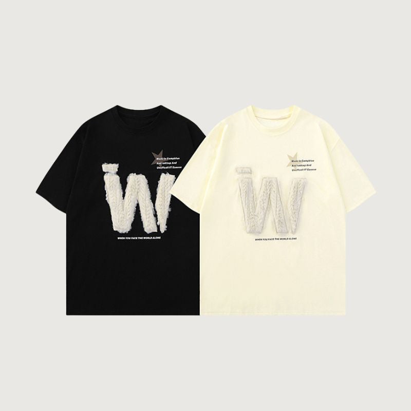 Camiseta con letras bordadas