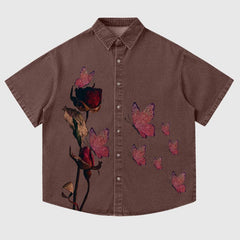 Camisa vaquera con mariposa rosa