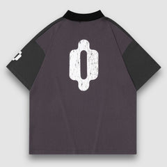 Camiseta polo con parche de medalla