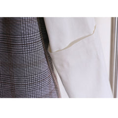 Blazer con recortes y estampado de cuadros escoceses