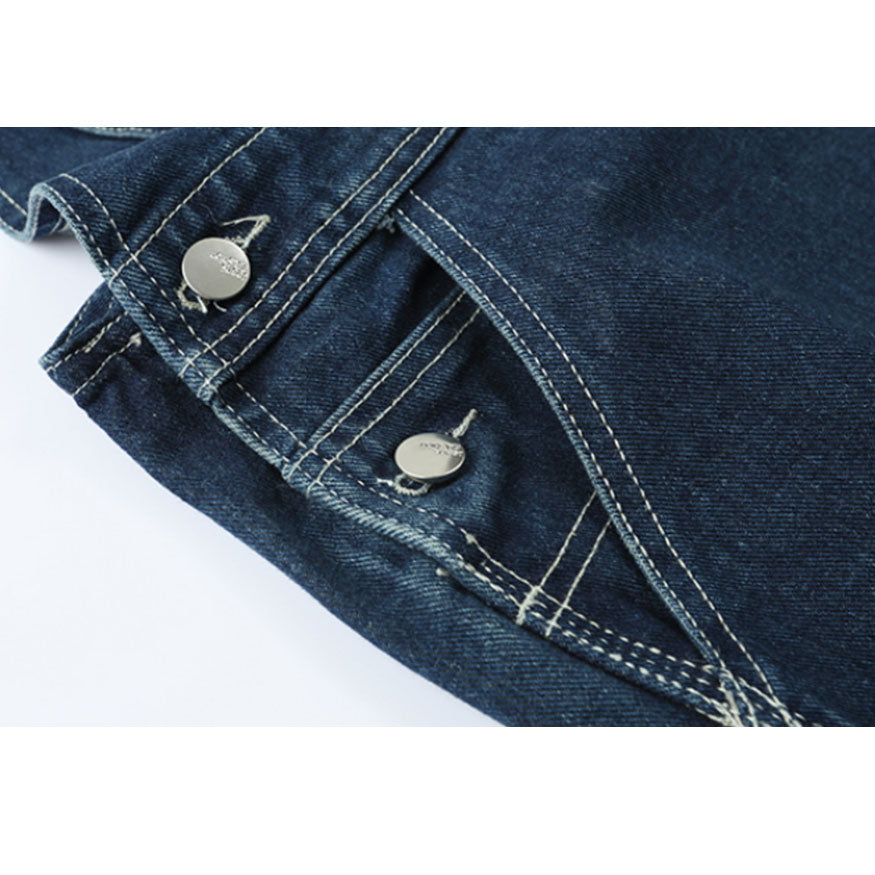 Peto vintage con bolsillos desgastados