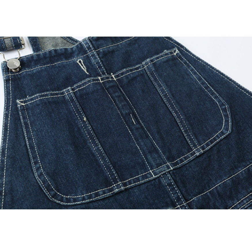 Peto vintage con bolsillos desgastados