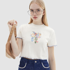 Crop Top mit Pflanzenstickerei