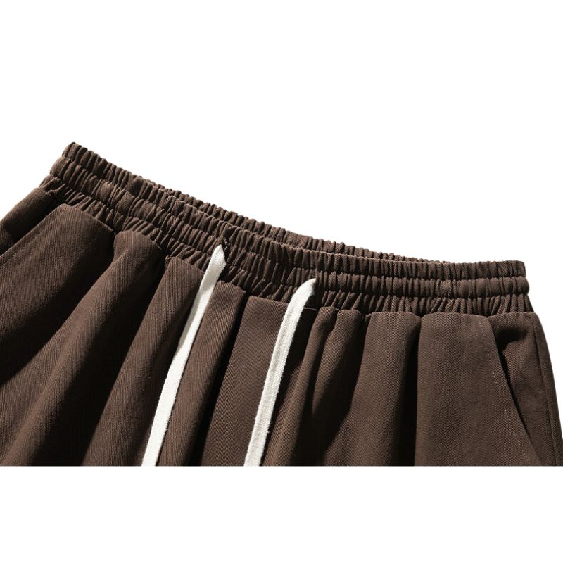 Pantalones cargo de color sólido con parche y múltiples bolsillos