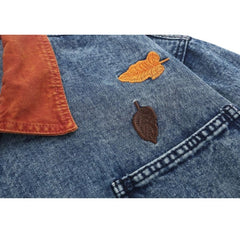 Chaqueta vaquera multibolsillos con bordado de follaje