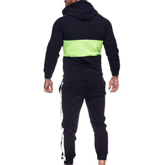 Conjunto deportivo de dos piezas con bloques de color para hombre en otoño