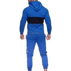 Conjunto deportivo de dos piezas con bloques de color para hombre en otoño