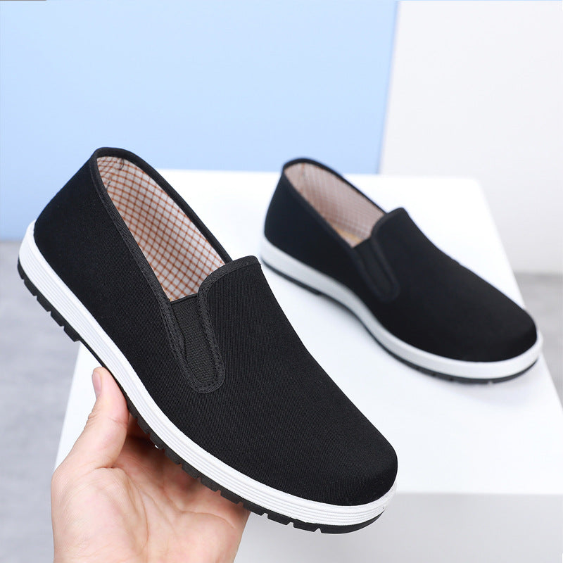 Zapatos de lona monofásicos negros de tela con suela gruesa para hombre