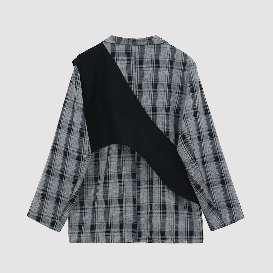 Blazer con hombros caídos y costuras a cuadros