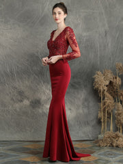 Handmade applique studded long sleeved evening dress