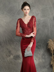 Handmade applique studded long sleeved evening dress