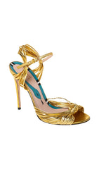 Riemchensandalen mit Absatz in Gold