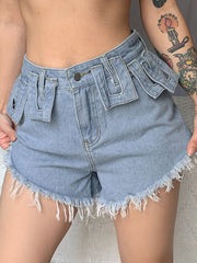 Shorts vaqueros desgastados con flecos en los puños 