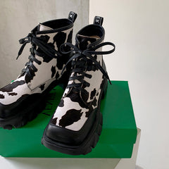 Nori Platform Cow Print Boots